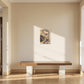 Hungry by Polina Gazeeva shown to scale in a room above a bench (42 x 59.4 cm)