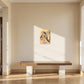Into Abstraction by Polina Gazeeva shown to scale in a room above a bench (42 x 59.4 cm)